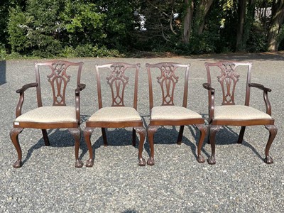 Lot 3201 - A set of four George III style mahogany dining...