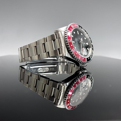 Lot 6 - A stainless steel gentleman's Rolex GMT Master...