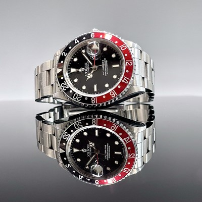Lot 6 - A stainless steel gentleman's Rolex GMT Master...