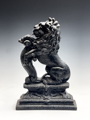 Lot 215 - A Victorian cast iron heraldic design doorstop...