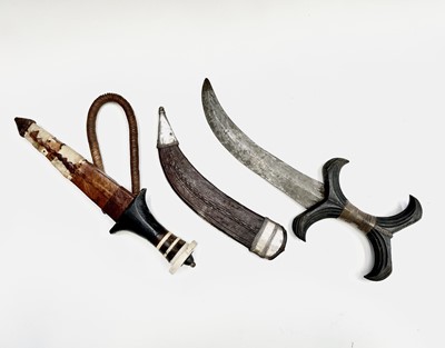 Lot 216 - A Hadendoa hook knife from Sudan, with fluted...