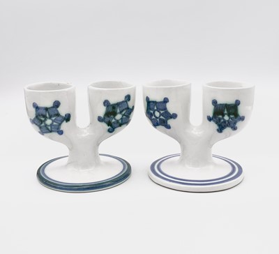 Lot 249 - Two Troika Pottery double egg cups, white with...