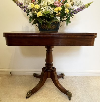 Lot 3138 - A William IV mahogany fold top card table, on...