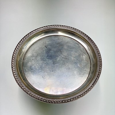 Lot 38 - A Cartier sterling card tray with gadrooned...