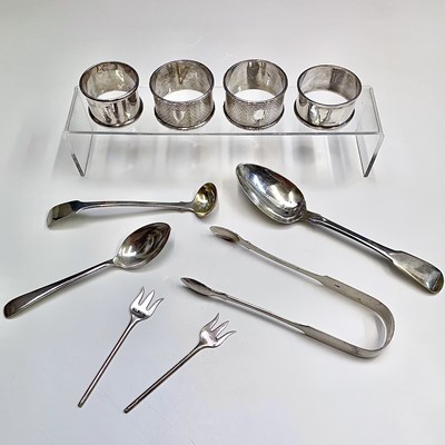 Lot 107 - Four silver napkin rings and a little silver...