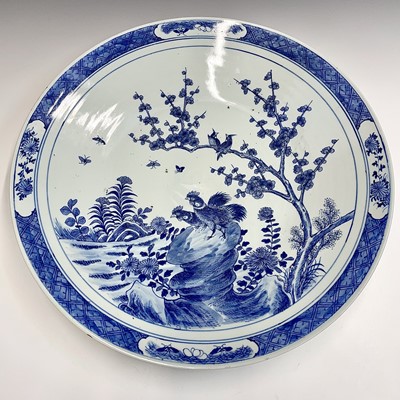 Lot 19 - A Chinese blue and white porcelain charger,...
