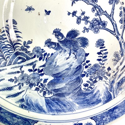 Lot 19 - A Chinese blue and white porcelain charger,...
