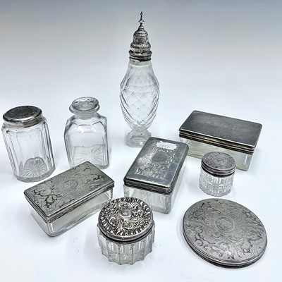 Lot 44 - Glass jars and silver lids