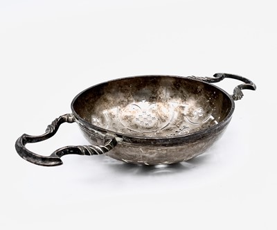 Lot 79 - A George II silver lemon strainer by John...