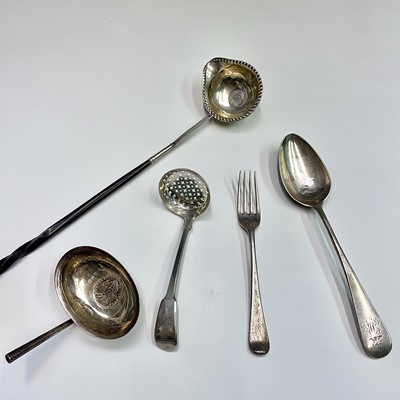 Lot 124 - A George III punch ladle with 1758 sixpence...