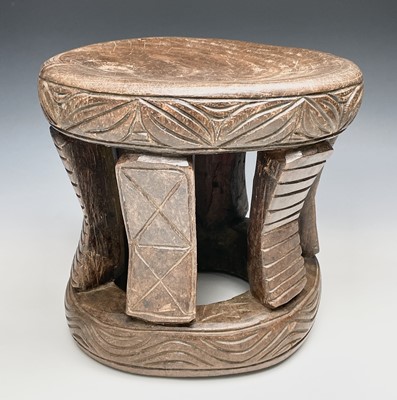 Lot 170 - A carved circular stool, Cameroon, Bamileke,...