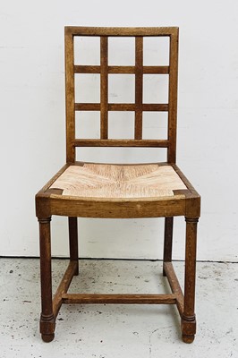 Lot 3139 - A Heal & Son limed oak chair with lattice back...