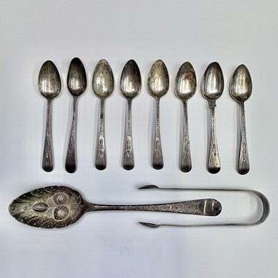 Lot 80 - A set of six George III bright-cut teaspoons...