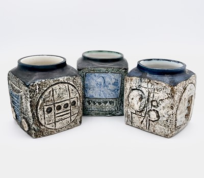 Lot 235 - Three Troika pottery cube vases, of typical...