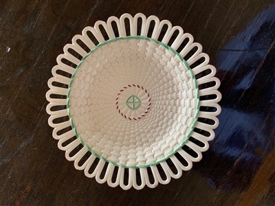 Lot 194 - A creamware circular plate, 18th century, with...