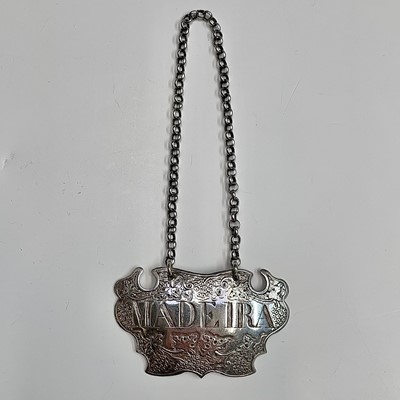 Lot 129 - An ornate George II shaped and vine chased...