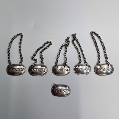 Lot 26 - A set of six silver condiment labels by...