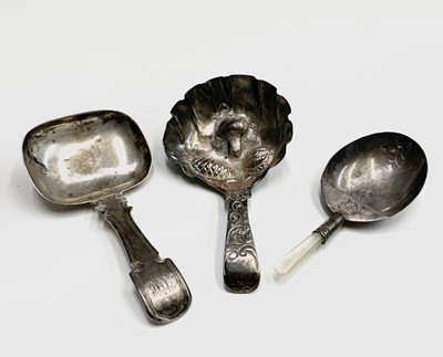 Lot 53 - A silver caddy spoon by Ledsam, Vale & Wheeler...