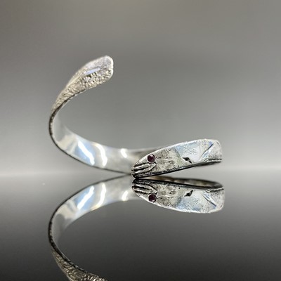 Lot 157 - A hand-crafted high purity silver eel bangle...