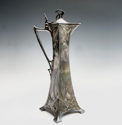 Lot 71 - A WMF Jugendstil tall jug with hinged lid 36.5cm