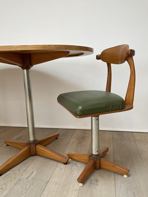 Lot 287 - A retro 1960/70's teak and walnut dining suite,...