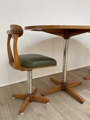 Lot 287 - A retro 1960/70's teak and walnut dining suite,...
