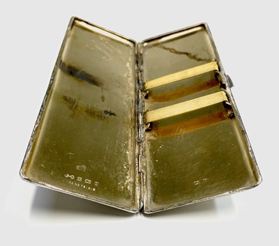 Lot 134 - An Art Deco engine-turned silver cigarette...