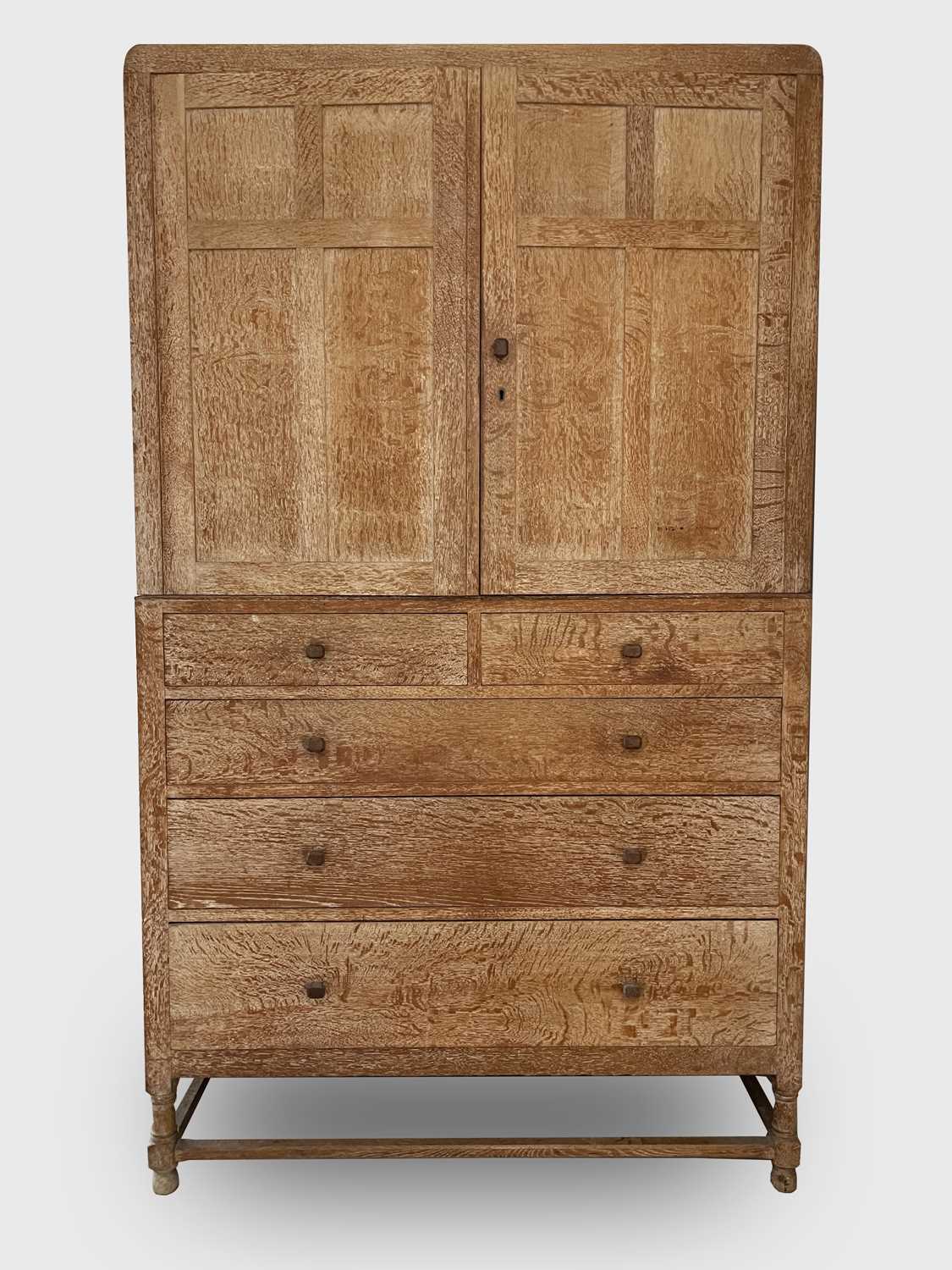 Lot 284 - A Heal's Arts & Crafts limed oak linen press,...