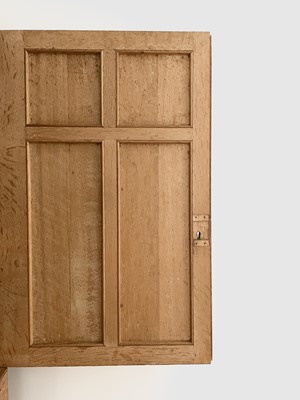 Lot 284 - A Heal's Arts & Crafts limed oak linen press,...