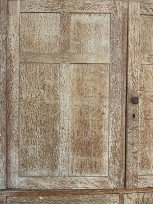 Lot 284 - A Heal's Arts & Crafts limed oak linen press,...