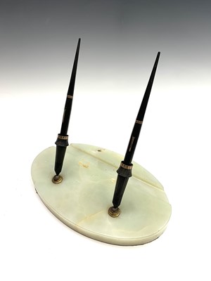 Lot 194 - An early 20th century onyx double pen stand...