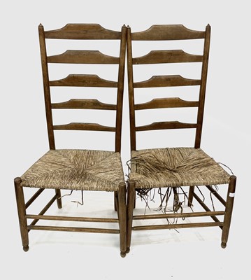 Lot 3215 - A set of three ash and elm ladderback dining...