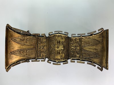 Lot 69 - A Chinese gilt bronze Gu-shaped vase, long...