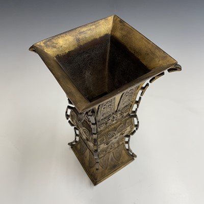 Lot 69 - A Chinese gilt bronze Gu-shaped vase, long...