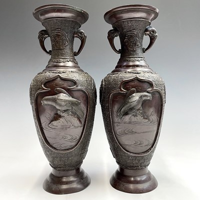 Lot 12 - A pair of Japanese bronze twin-handled vases,...