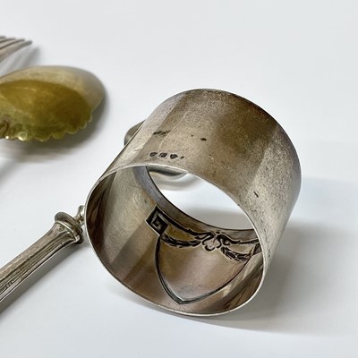 Lot 15 - A continental white metal napkin ring stamped...