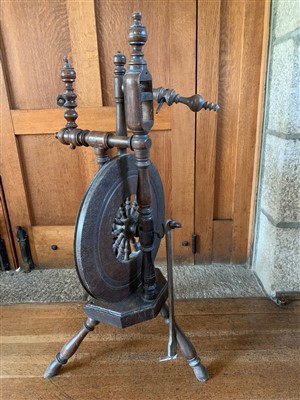 Lot 56 - An oak and fruitwood spinning wheel, 19th...