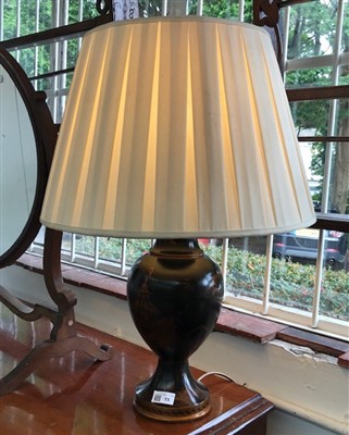 Lot 15 - A black Japanned table lamp.