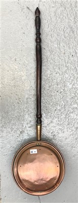 Lot 32 - A Victorian copper warming pan.