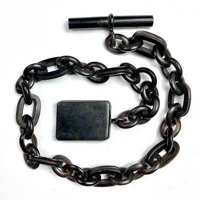Lot 206 - A horn watch chain albert, length 28.5cm.