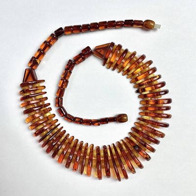 Lot 777 - An Art Deco amber and butterscotch necklace...