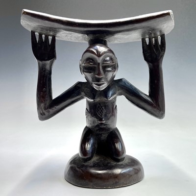 Lot 100 - An African Luba, wood carved female caryatid...