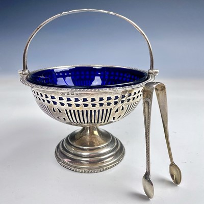 Lot 34 - A George V silver sugar basket with chased...
