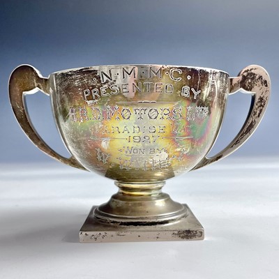 Lot 33 - A George V silver twin handle pedestal trophy...