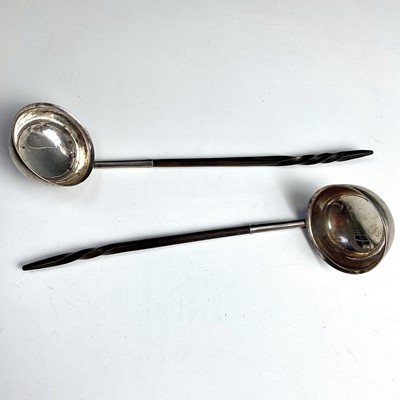 Lot 39 - A pair of Georgian silver small toddy ladles...