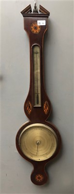 Lot 12 - A George III mahogany wheel barometer by A....