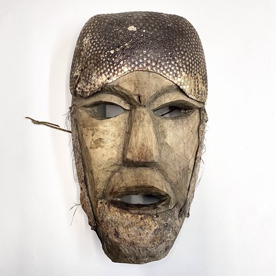 Lot 74 - An African mask with snakeskin detail, length...