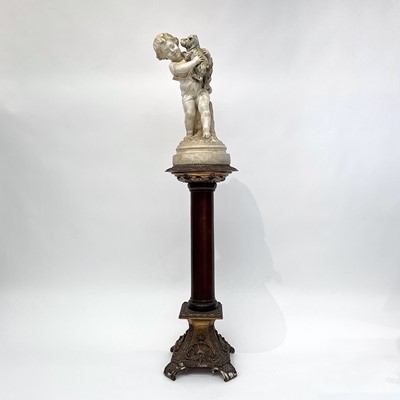 Lot 142 - A composite marble figure of a child and their...