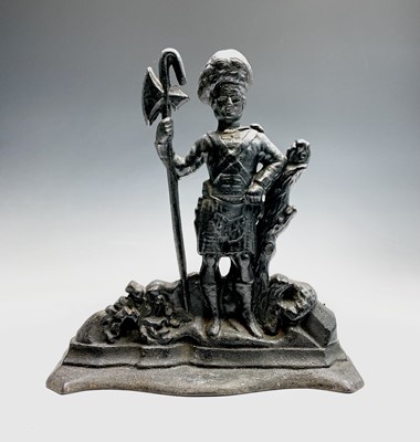 Lot 160 - A figural doorstop cast as a guardsman, height...