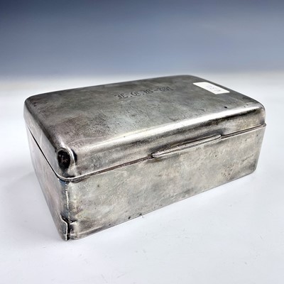 Lot 59 - A George V silver cigarette box, engraved...